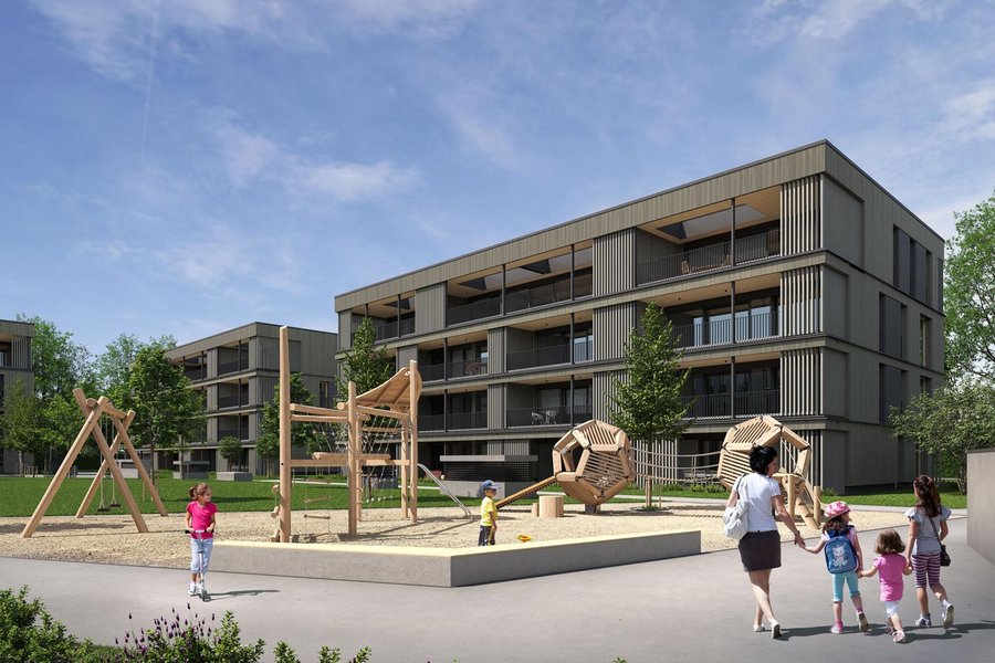 ohngebäude mit Spielplatz im Vordergrund, aufgenommen bei Tageslicht – NaturElla in Langenargen